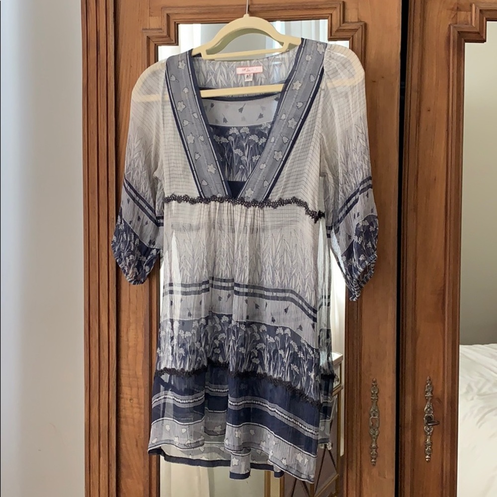 Super cute and versatile sheer Tunic!